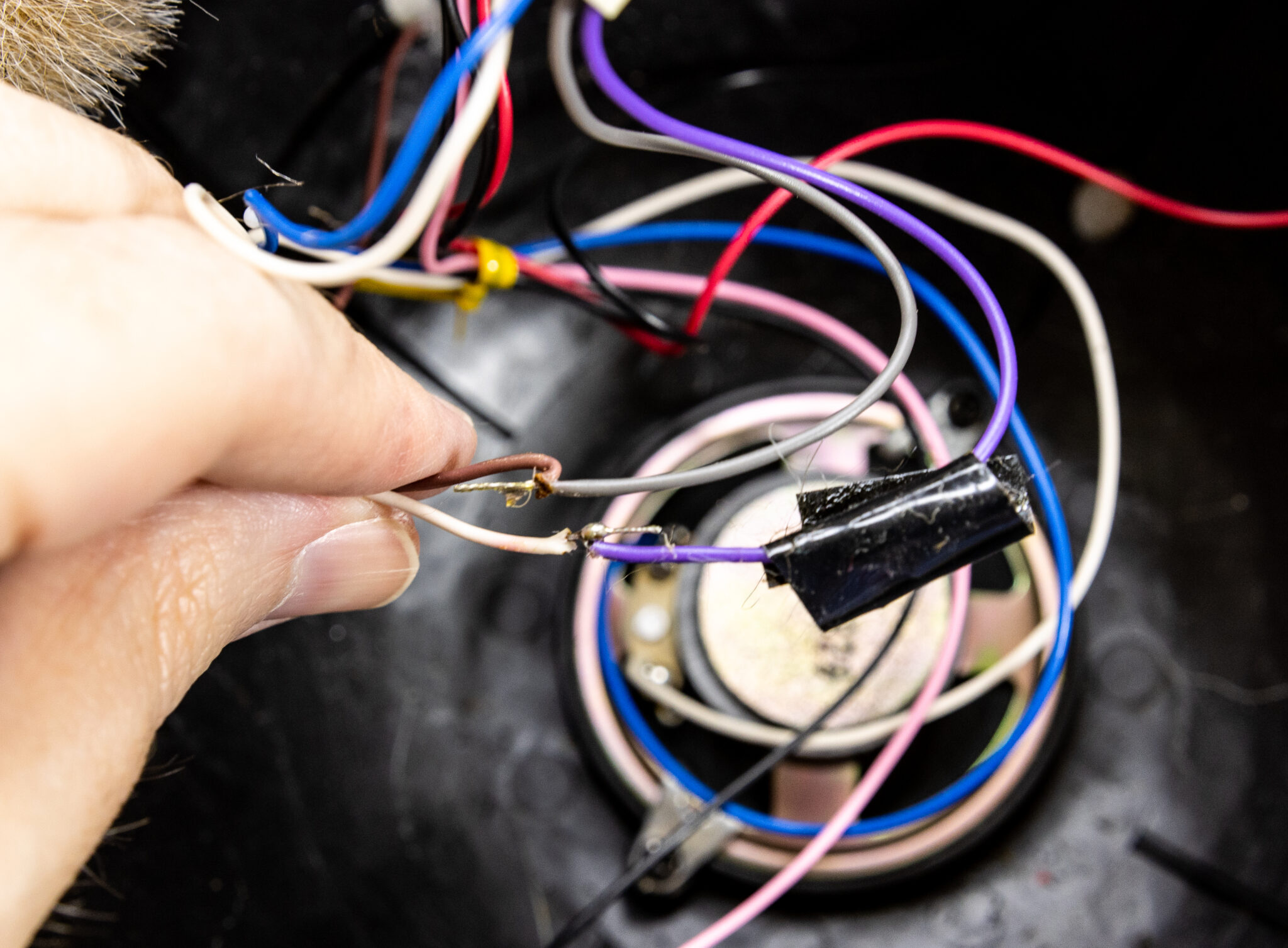 A photo of hand soldered wires